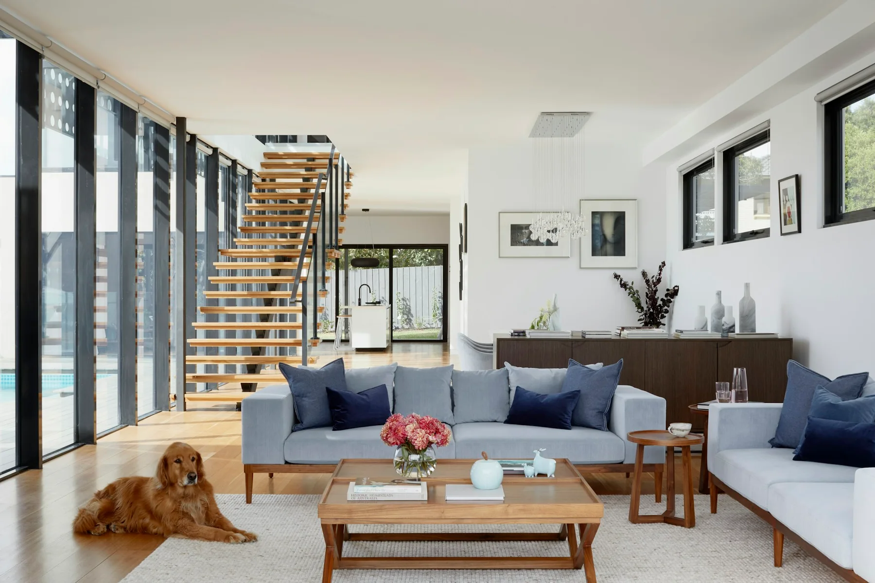 Quiet living space opening toward a planted courtyard