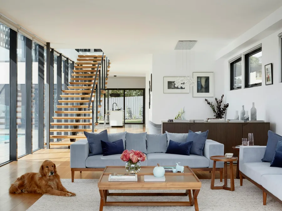 Quiet living space opening toward a planted courtyard